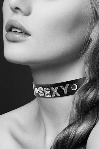 Чёрный чокер с надписью Bijoux Pour Toi COLLIER STRASS SEXY CUIR BOVIN 6050120010