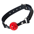 Красный кляп-шарик на чёрном регулируемом ремешке Штучки-дрючки 690207