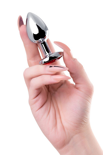 Серебристая гладкая коническая анальная пробка с красным кристаллом Штучки-дрючки 690126 (7 см)