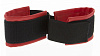 Черные полиуретановые манжеты с красным подкладом для фиксации рук вместе Blush Novelties Bound Together Wrist Restraints 520034