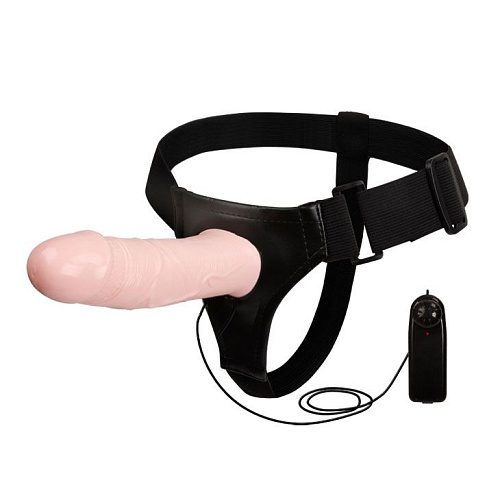 Полый страпон телесного цвета на чёрных трусиках с вибрацией и выносным пультом управления Baile BW-022039-1002 (17 см)