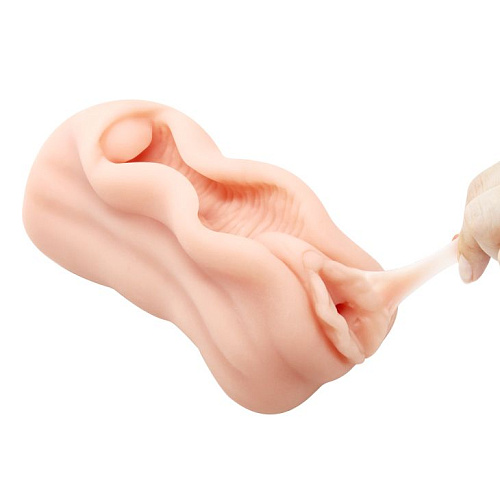 Реалистичная вагина-мастурбатор телесного цвета с необычным дизайном Baile BM-009184